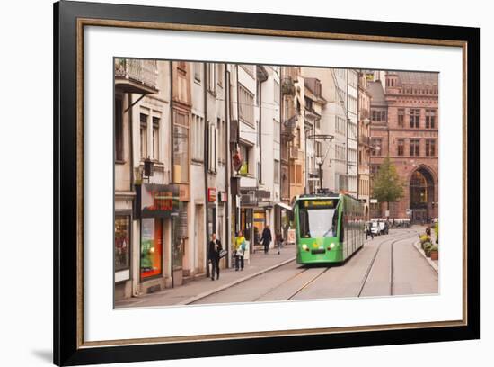 A Tram Runs Down the Streets of Basel in Switzerland, Europe-Julian Elliott-Framed Photographic Print