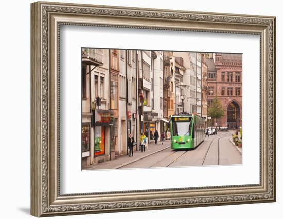 A Tram Runs Down the Streets of Basel in Switzerland, Europe-Julian Elliott-Framed Photographic Print