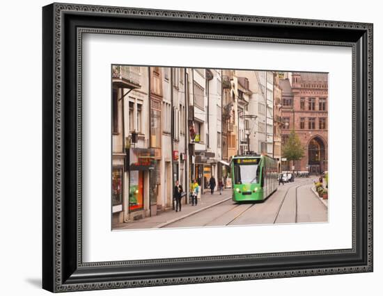 A Tram Runs Down the Streets of Basel in Switzerland, Europe-Julian Elliott-Framed Photographic Print