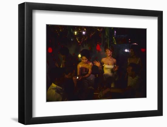 A Trio of Hostesses Attend to a Table of Men at the Albion Jazz Coffee Shop, Tokyo, Japan, 1962-Eliot Elisofon-Framed Photographic Print