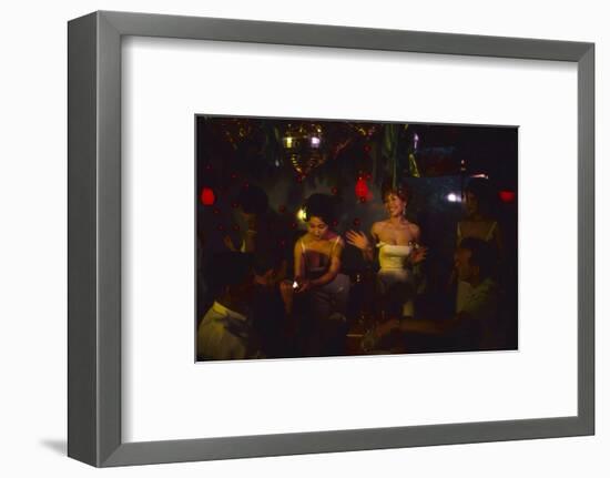 A Trio of Hostesses Attend to a Table of Men at the Albion Jazz Coffee Shop, Tokyo, Japan, 1962-Eliot Elisofon-Framed Photographic Print