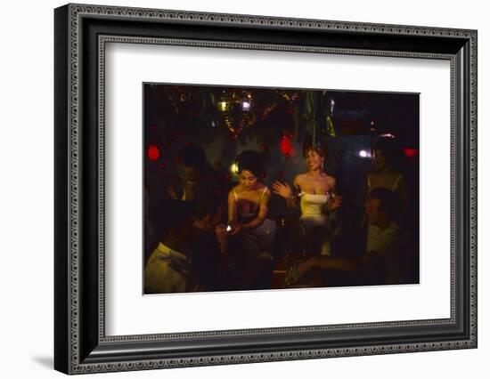 A Trio of Hostesses Attend to a Table of Men at the Albion Jazz Coffee Shop, Tokyo, Japan, 1962-Eliot Elisofon-Framed Photographic Print