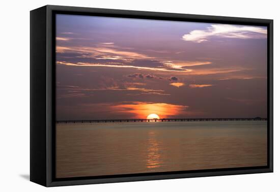 A Truck Is Silhouetted Against the Rising Sun as it Crosses the Bridge-Sheila Haddad-Framed Premier Image Canvas