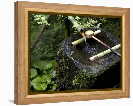 A Tsukubai With Bamboo Ladle in a Garden at Sanzenin Temple in Ohara, Kyoto, Japan-null-Framed Premier Image Canvas