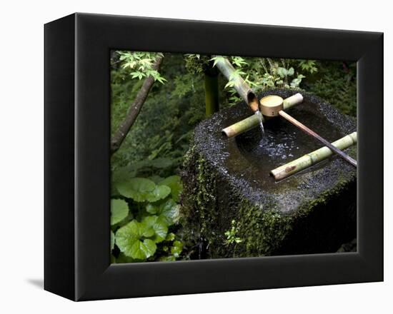 A Tsukubai With Bamboo Ladle in a Garden at Sanzenin Temple in Ohara, Kyoto, Japan-null-Framed Premier Image Canvas