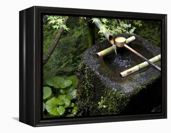 A Tsukubai With Bamboo Ladle in a Garden at Sanzenin Temple in Ohara, Kyoto, Japan-null-Framed Premier Image Canvas