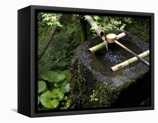 A Tsukubai With Bamboo Ladle in a Garden at Sanzenin Temple in Ohara, Kyoto, Japan-null-Framed Premier Image Canvas