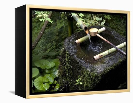 A Tsukubai With Bamboo Ladle in a Garden at Sanzenin Temple in Ohara, Kyoto, Japan-null-Framed Premier Image Canvas