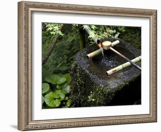 A Tsukubai With Bamboo Ladle in a Garden at Sanzenin Temple in Ohara, Kyoto, Japan-null-Framed Photographic Print