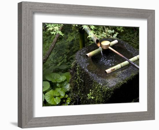 A Tsukubai With Bamboo Ladle in a Garden at Sanzenin Temple in Ohara, Kyoto, Japan-null-Framed Photographic Print