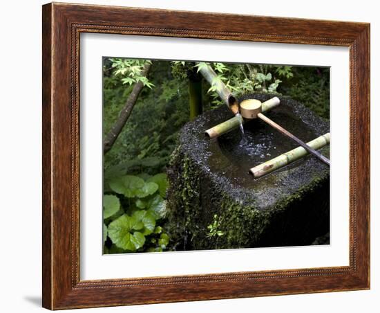 A Tsukubai With Bamboo Ladle in a Garden at Sanzenin Temple in Ohara, Kyoto, Japan-null-Framed Photographic Print