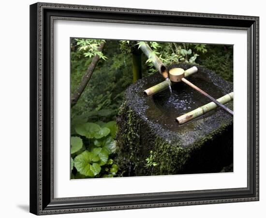 A Tsukubai With Bamboo Ladle in a Garden at Sanzenin Temple in Ohara, Kyoto, Japan-null-Framed Photographic Print