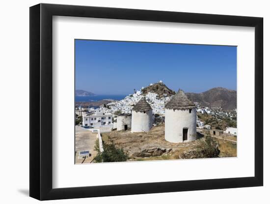 A Typical Greek Village Perched on a Rock with White and Blue Houses and Quaint Windmills, Ios-Roberto Moiola-Framed Photographic Print