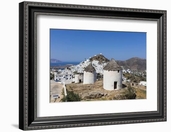 A Typical Greek Village Perched on a Rock with White and Blue Houses and Quaint Windmills, Ios-Roberto Moiola-Framed Photographic Print