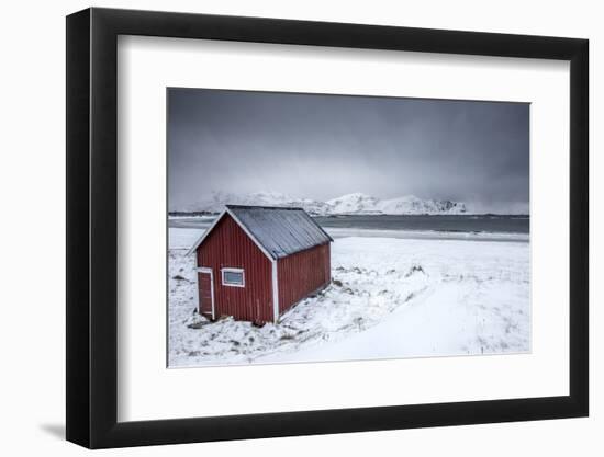 A Typical House of the Fishermen Called Rorbu on the Snowy Beach Framed the Icy Sea, Norway-Roberto Moiola-Framed Photographic Print