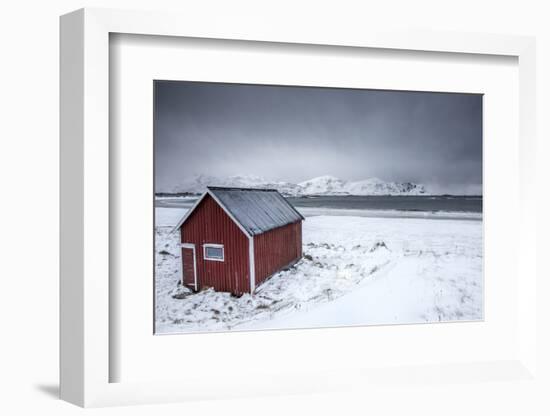 A Typical House of the Fishermen Called Rorbu on the Snowy Beach Framed the Icy Sea, Norway-Roberto Moiola-Framed Photographic Print