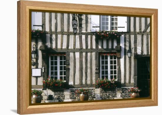 A Typical Traditional Timber Framed Building with Flowers in Window Boxes-LatitudeStock-Framed Premier Image Canvas