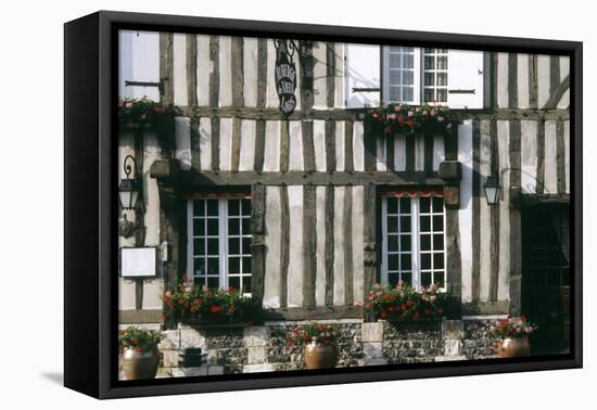 A Typical Traditional Timber Framed Building with Flowers in Window Boxes-LatitudeStock-Framed Premier Image Canvas
