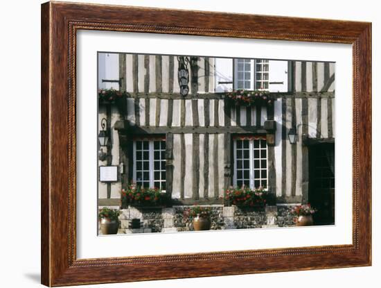 A Typical Traditional Timber Framed Building with Flowers in Window Boxes-LatitudeStock-Framed Photographic Print