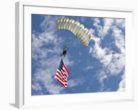A U.S. Air Force Member Glides Through the Sky with TheAmerican Flag-Stocktrek Images-Framed Photographic Print