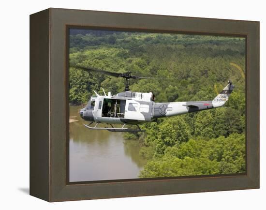 A U.S. Air Force Uh-1H Huey in an Experiment Paint Scheme-null-Framed Premier Image Canvas