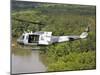 A U.S. Air Force Uh-1H Huey in an Experiment Paint Scheme-null-Mounted Photographic Print