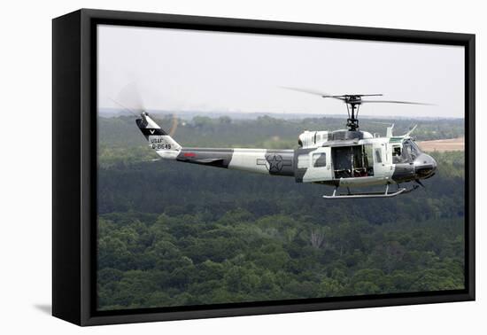 A U.S. Air Force Uh-1H Huey in an Experiment Paint Scheme-null-Framed Premier Image Canvas