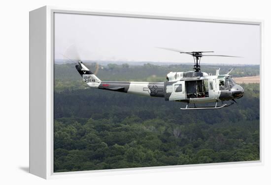 A U.S. Air Force Uh-1H Huey in an Experiment Paint Scheme-null-Framed Premier Image Canvas