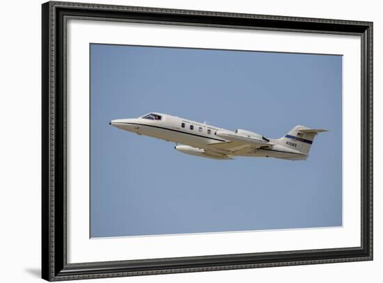 A U.S. Air Forces in Europe C-21 Learjet Flying over Stuttgart, Germany-Stocktrek Images-Framed Photographic Print