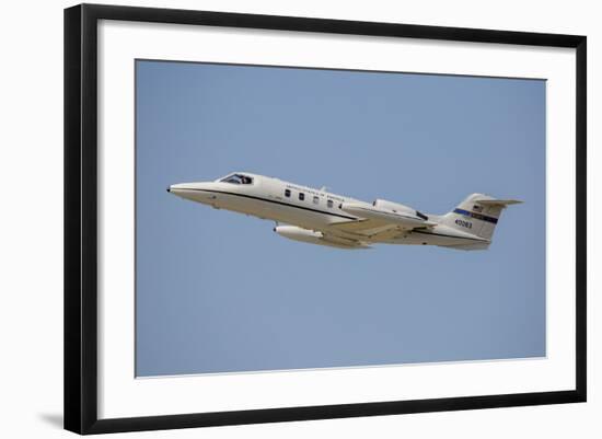 A U.S. Air Forces in Europe C-21 Learjet Flying over Stuttgart, Germany-Stocktrek Images-Framed Photographic Print