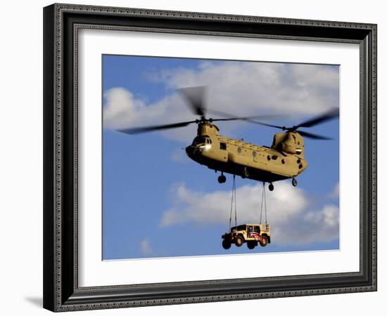 A U.S. Army CH-47 Chinook Helicopter Transports a Humvee-Stocktrek Images-Framed Photographic Print