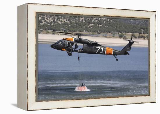 A U.S. Army Uh-60 Black Hawk Helicopter Collects Water from a Reservoir-null-Framed Premier Image Canvas