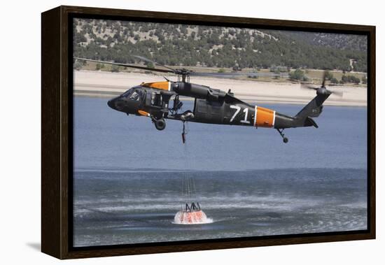 A U.S. Army Uh-60 Black Hawk Helicopter Collects Water from a Reservoir-null-Framed Premier Image Canvas