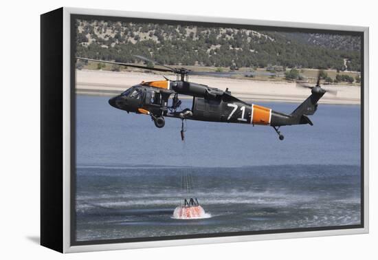 A U.S. Army Uh-60 Black Hawk Helicopter Collects Water from a Reservoir-null-Framed Premier Image Canvas