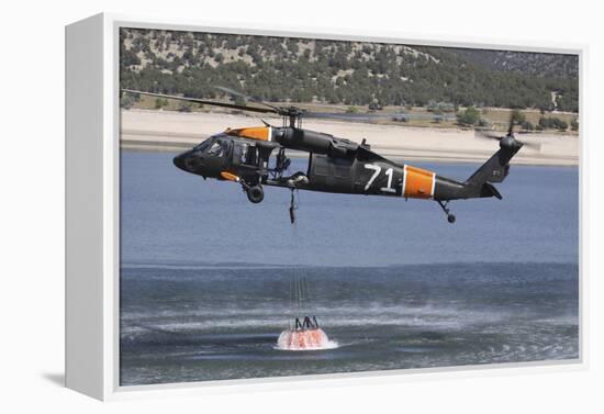 A U.S. Army Uh-60 Black Hawk Helicopter Collects Water from a Reservoir-null-Framed Premier Image Canvas