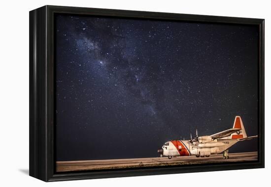 A U.S. Coast Guard C-130 Hercules Parked on the Tarmac on a Starry Night-null-Framed Premier Image Canvas