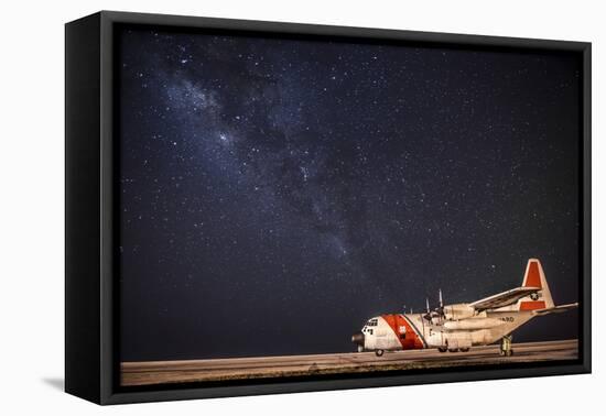 A U.S. Coast Guard C-130 Hercules Parked on the Tarmac on a Starry Night-null-Framed Premier Image Canvas