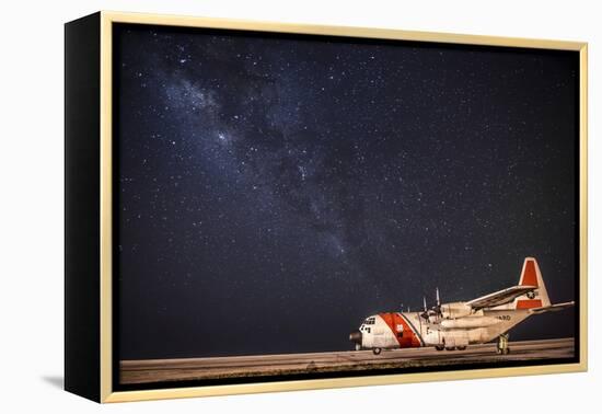 A U.S. Coast Guard C-130 Hercules Parked on the Tarmac on a Starry Night-null-Framed Premier Image Canvas