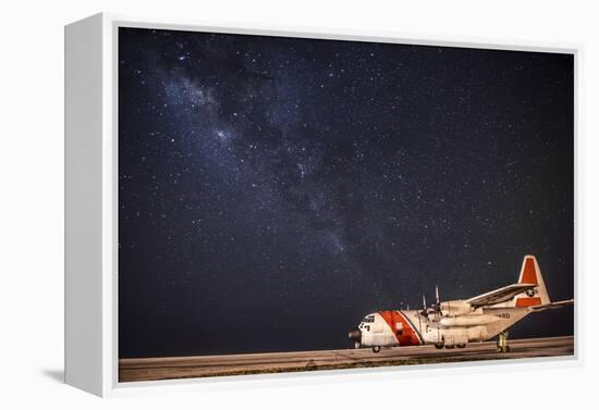 A U.S. Coast Guard C-130 Hercules Parked on the Tarmac on a Starry Night-null-Framed Premier Image Canvas