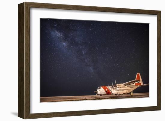 A U.S. Coast Guard C-130 Hercules Parked on the Tarmac on a Starry Night-null-Framed Photographic Print