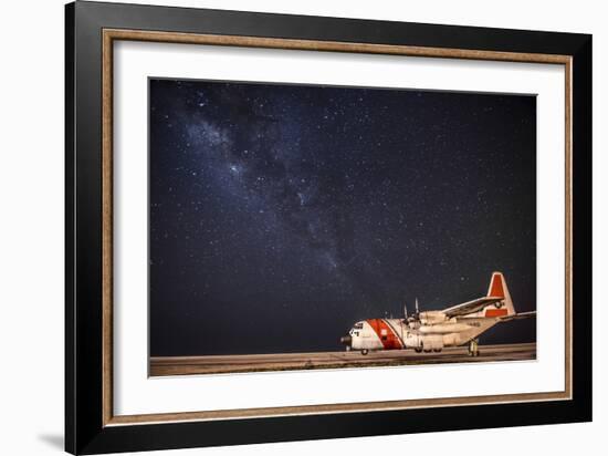 A U.S. Coast Guard C-130 Hercules Parked on the Tarmac on a Starry Night-null-Framed Photographic Print