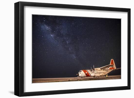 A U.S. Coast Guard C-130 Hercules Parked on the Tarmac on a Starry Night-null-Framed Photographic Print