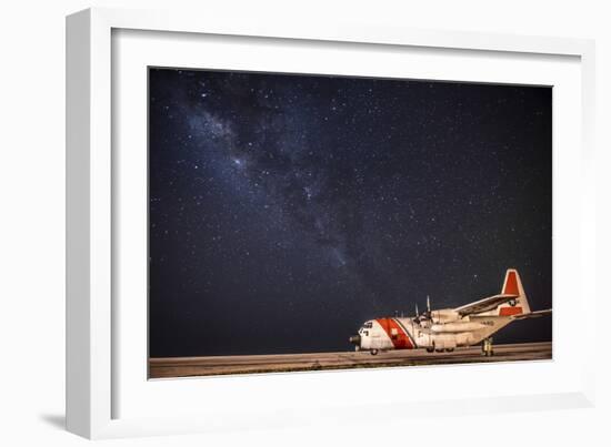 A U.S. Coast Guard C-130 Hercules Parked on the Tarmac on a Starry Night-null-Framed Photographic Print