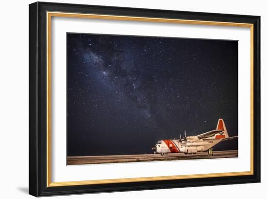 A U.S. Coast Guard C-130 Hercules Parked on the Tarmac on a Starry Night-null-Framed Photographic Print