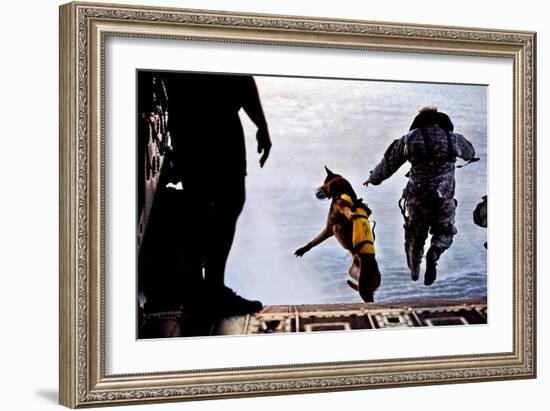 A U.S. Soldier And His Military Working Dog Jump Off the Ramp of a CH-47 Chinook-Stocktrek Images-Framed Art Print
