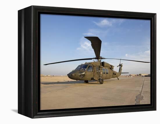 A UH-60 Black Hawk Helicopter at Camp Speicher, Iraq-null-Framed Premier Image Canvas