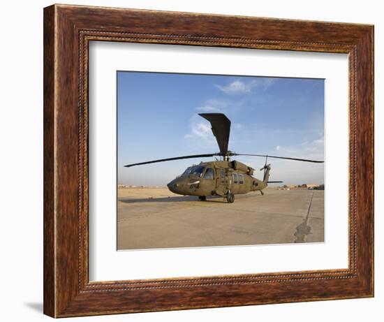 A UH-60 Black Hawk Helicopter at Camp Speicher, Iraq-null-Framed Photographic Print