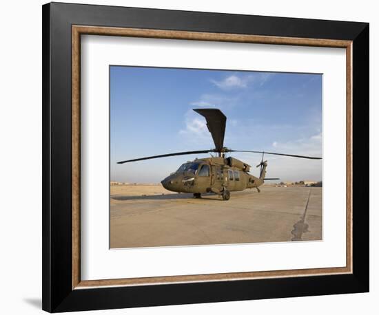 A UH-60 Black Hawk Helicopter at Camp Speicher, Iraq-null-Framed Photographic Print