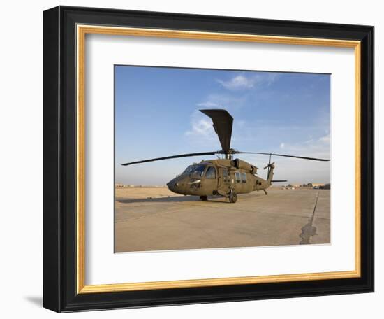 A UH-60 Black Hawk Helicopter at Camp Speicher, Iraq-null-Framed Photographic Print