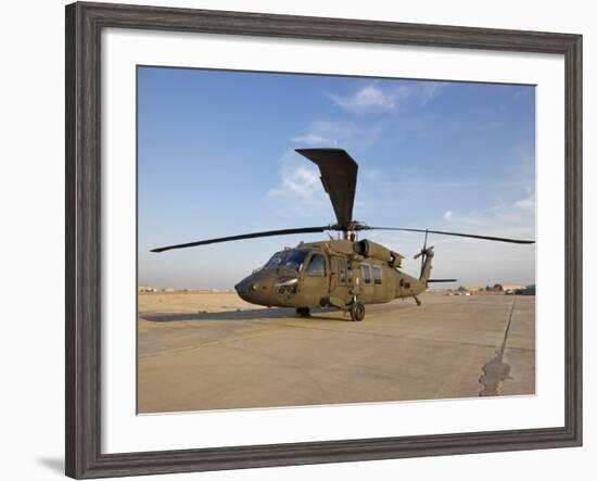 A UH-60 Black Hawk Helicopter at Camp Speicher, Iraq-null-Framed Photographic Print